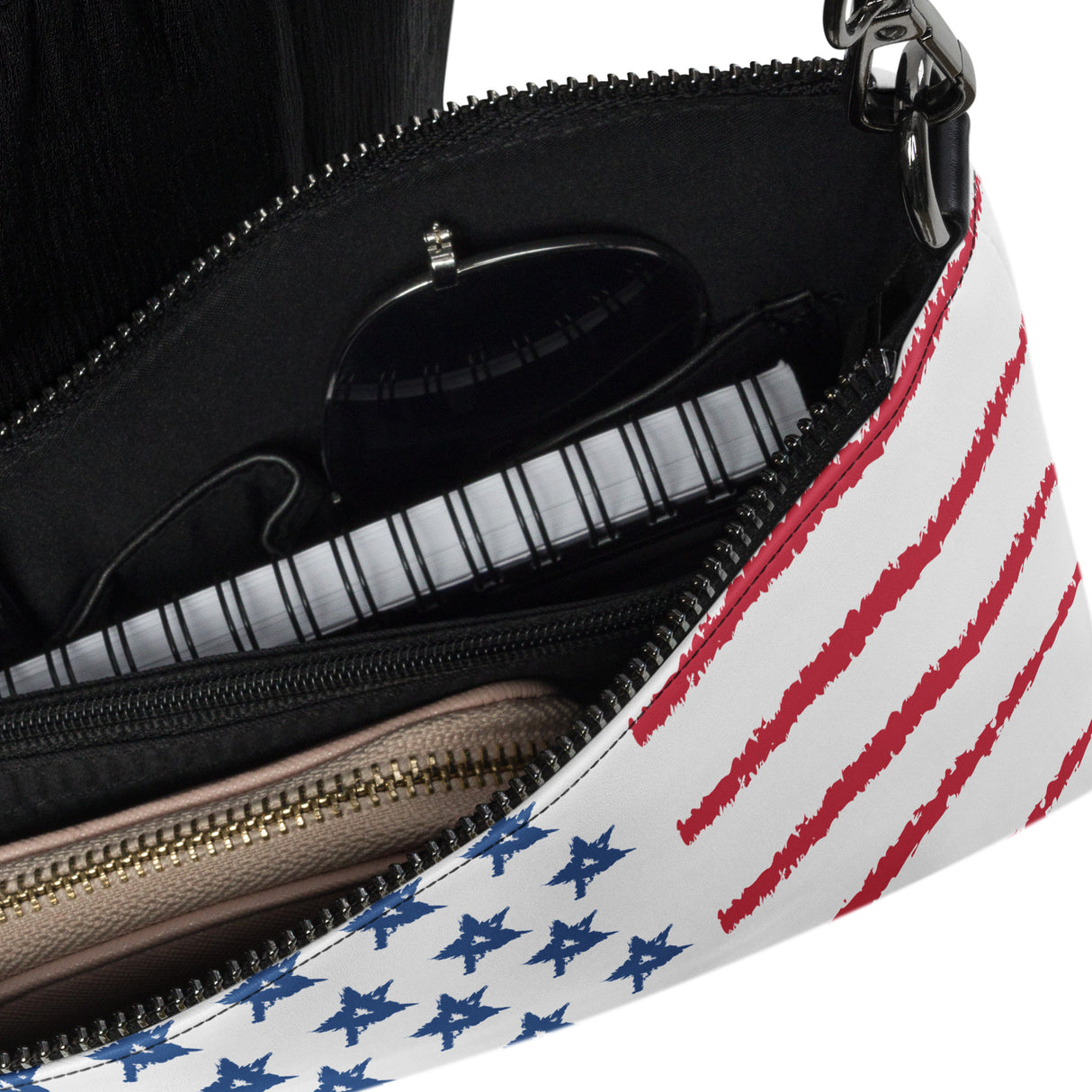 Mini leather crossbody purse with American flag design showing interior compartments and zipper