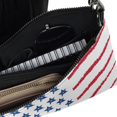 Mini leather crossbody purse with American flag design showing interior compartments and zipper