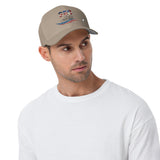 Man wearing a beige united states of america hat with 250th anniversary design and patriotic colors